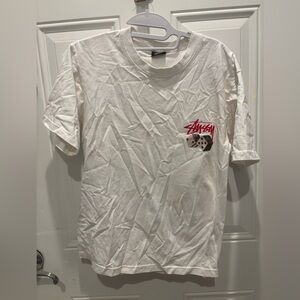 Stussy White Short Sleeve Tee with Red Dice Graphic